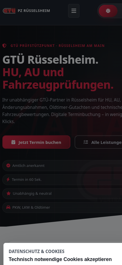 Fahrzeug auf der Hebebühne im GTÜ Prüfzentrum Atlan
